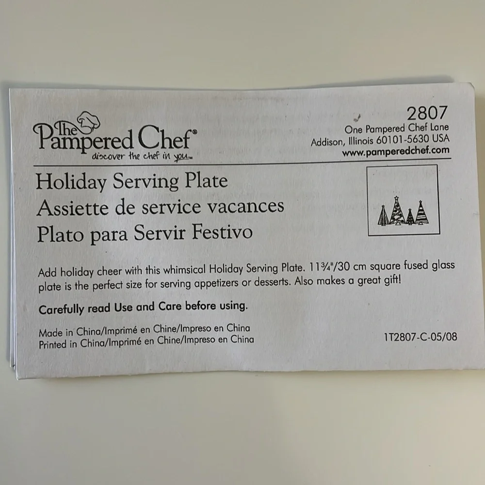 The Pampered Chef Holiday Serving Plate and‎ Set of 2 Holiday Spreaders.